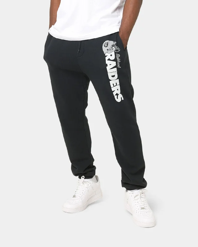 Mitchell & Ness Raiders Wordmark Sweat Pants Faded Black Trendy Printed Pants