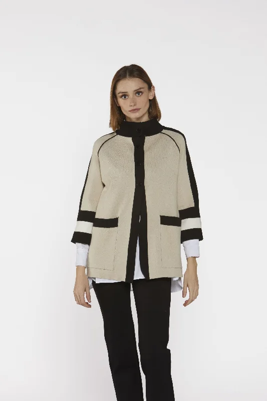 High neck Poncho/Jacket in Stone with black stripe detail. Elasticated Jacket Padded Jacket Insulated Jacket High neck Poncho/Jacket in Stone with black stripe detail. Elasticated Jacket Padded Jacket Insulated Jacket