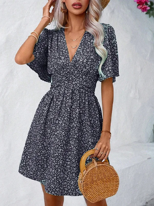 Blue Zone Planet |  Printed V-Neck Half Sleeve Mini Dress Chic Halter Mini Dress